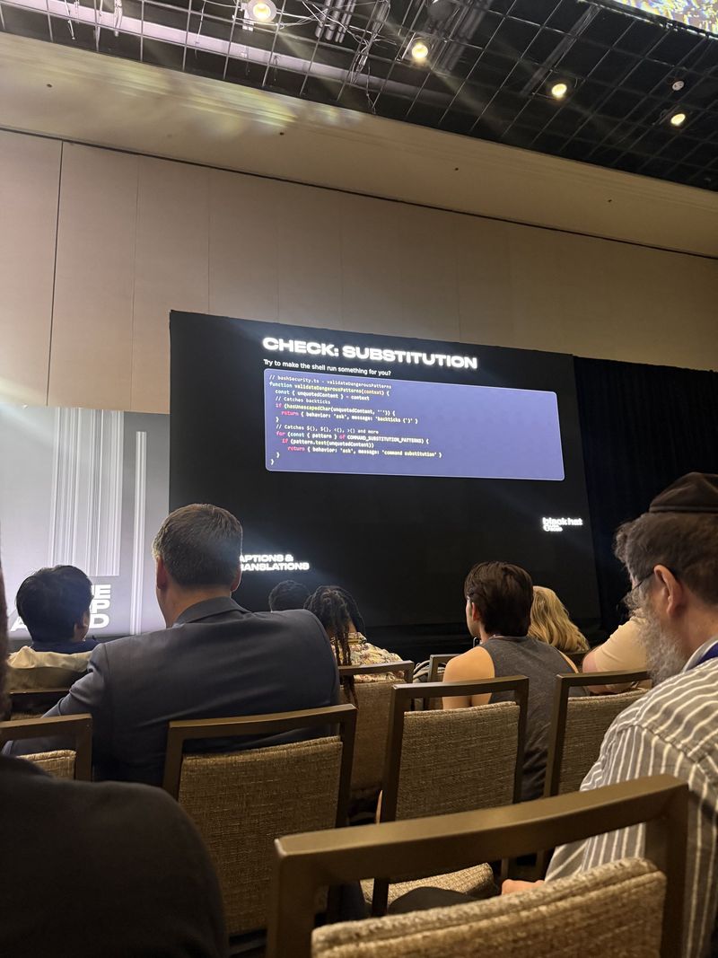 Slide: Claude Code Action tag mode defaults, listing pre-approved file tools and git operations alongside the 23 checks in the security guardrail pipeline